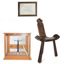 Carved birthing stool on three legs, together set of cased balance scales and framed certi...