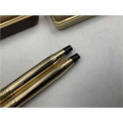 Group of five rolled gold Cross pens and propelling pencils, to include a fountain pen with gold nib stamped 14K 585, pencil and pen set with pouch, etc, all with boxes (5)