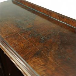 Early 20th century burr walnut display side cabinet, the glass inset top over a central glazed door with geometric astragal glazing, flanked by curved cupboards, shaped apron fitted with drawer, on cabriole legs with shell carved knees and pad feet