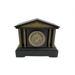 French slate mantle clock striking on a gong. 