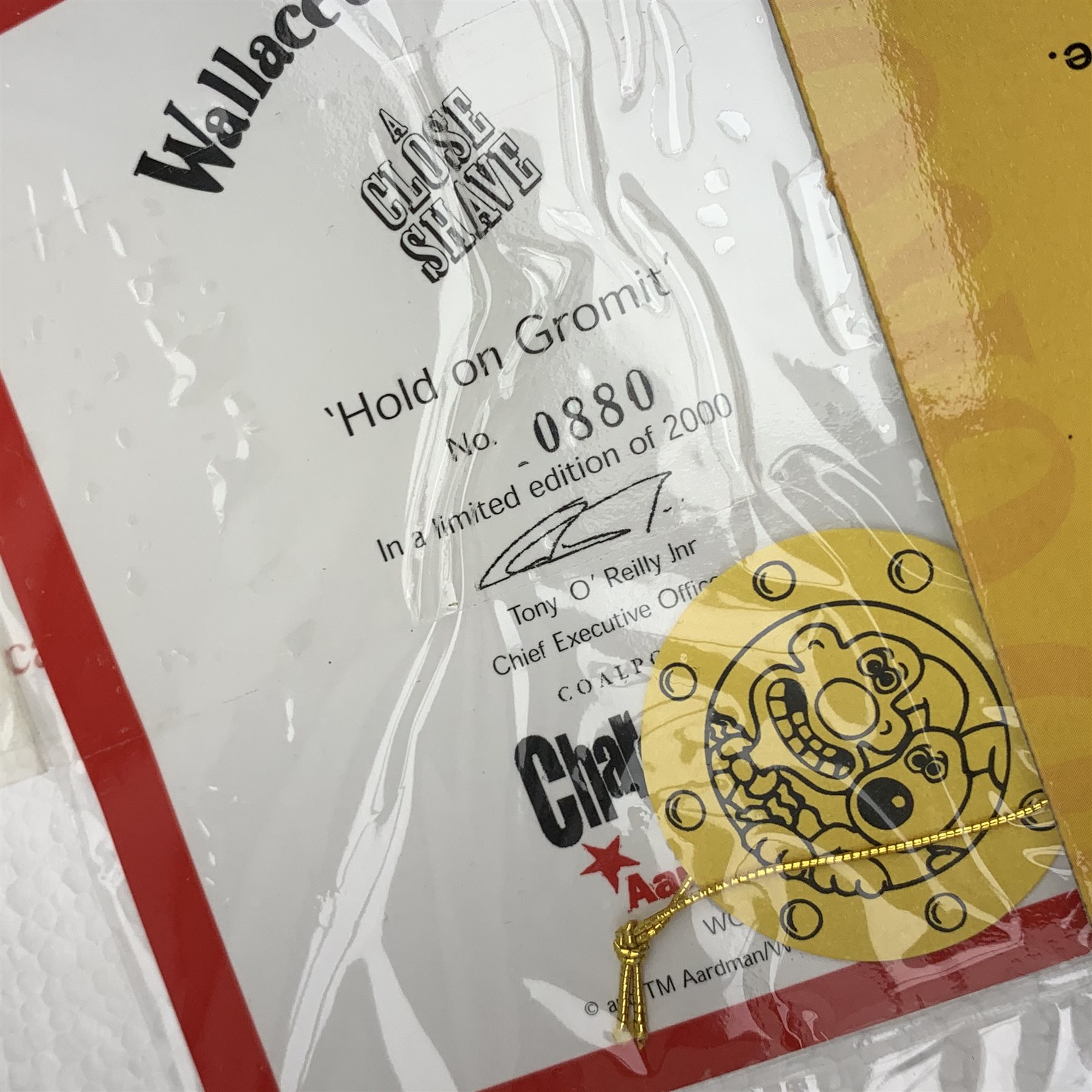 A group of six Coalport Wallace & Gromit figurines, comprising 'Hold on Gromit' no880/2000 with certificate, 'Decorating in Techno Trousers' no1195/2000 with certificate, 'Reading for Take Off', 'Do something Gromit', 'Feathers in disguise', 'Happy Birthday Gromit', each in maker's box with accompanying swing tag.