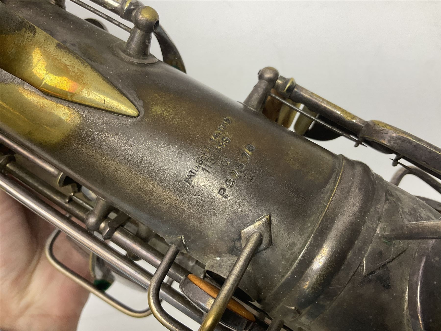 Early 20th century Elkhart Pan American C-Melody saxophone, Patd. Sept.14 1915, no.1153489, serial no.P27678; in fitted hard carrying case with crook