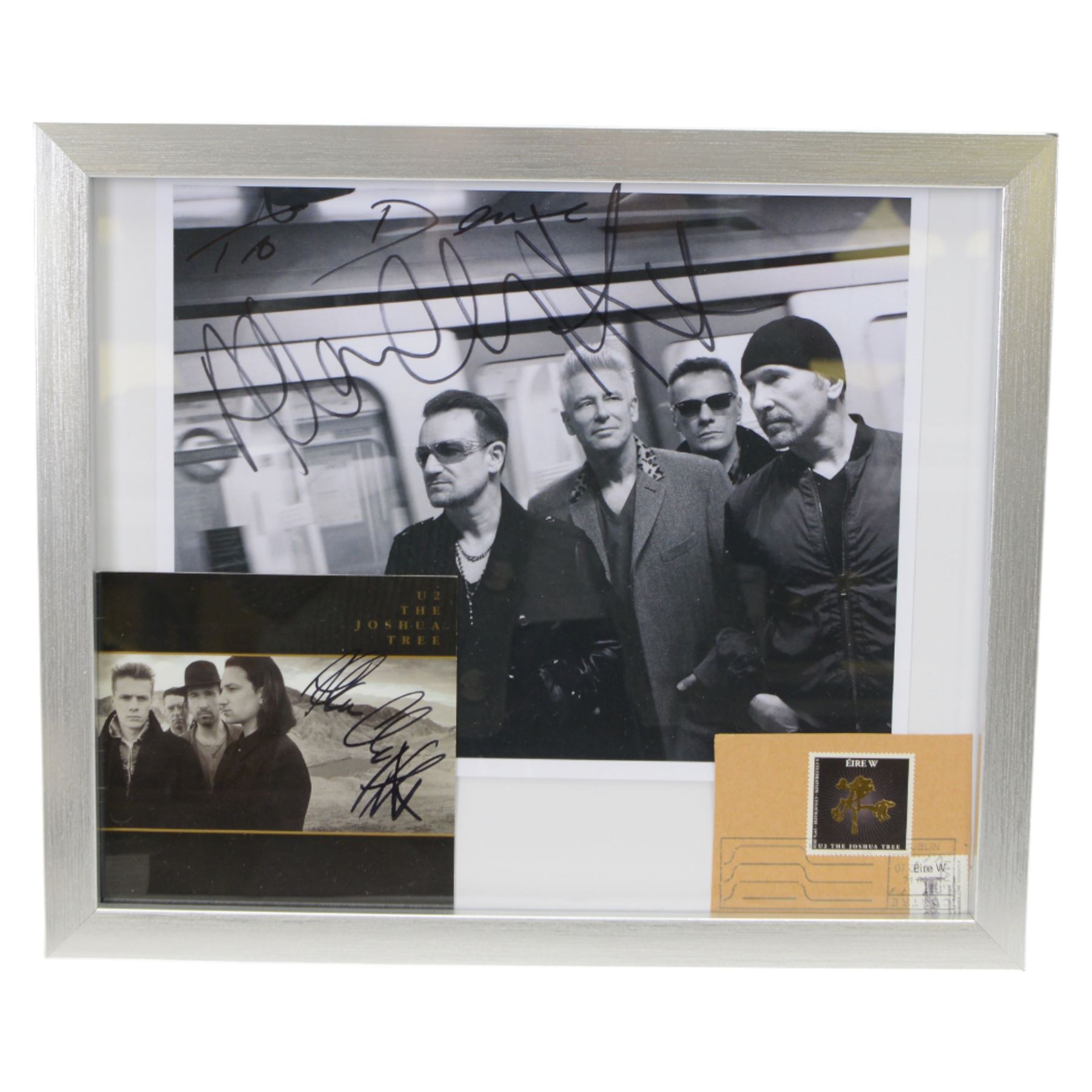 U2 framed signed photograph, together with Surrender Bono's autobiography first edition and two other U2 books  