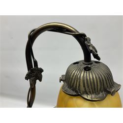 Art Nouveau style lamp in the form of a woman on a swing, with a green mottled shade, upon a marble base H52cm