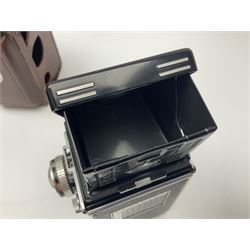 Rollei Rolleiflex 3.5C camera body, serial no 1775847, with 'Planar 1.35 f-75mm' lens serial no 1788432 and 'Heidosmat 1:2.8/75' lens serial no 2440876, complete with a cased set of additional lenses 