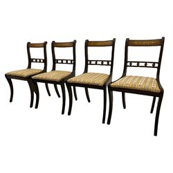 Set of eight Regency style mahogany dining chairs, brass inlay with gilded detail