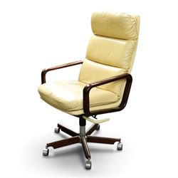 Dyrlund - Santos rosewood office suite, comprising an executive desk and cream leather upholstered swivel chair, the desk with a broad rectangular top with rounded corners, leather writing surface, pen compartments and letter tray, three lockable frieze drawers with fitted interiors above a central kneehole flanked by floating drawer pedestals, the left housing a filing drawer and the right three compartmented drawers, with a full width modesty panel to the reverse, chair raised on a castor base, H 116cm, W 62cm, D 74cm