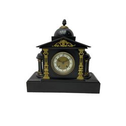 French - 8-day late 19th century slate mantle clock, with an architectural pediment surmounted by a dome and finial, semi-circular rotundas to the sides on a deep rectangular stepped plinth, with cast brass decoration to the tympanum and dial, enamel chapter, gilt centre, Arabic numerals and pierced steel hands, eight-day French movement striking the hours and half-hours on a coiled gong.  With pendulum.