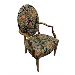 Pair of George III mahogany framed open armchairs, oval back and serpentine seat upholstered in fruit and foliage patterned fabric, shaped and moulded arms and arm supports, on square tapering moulded front supports 