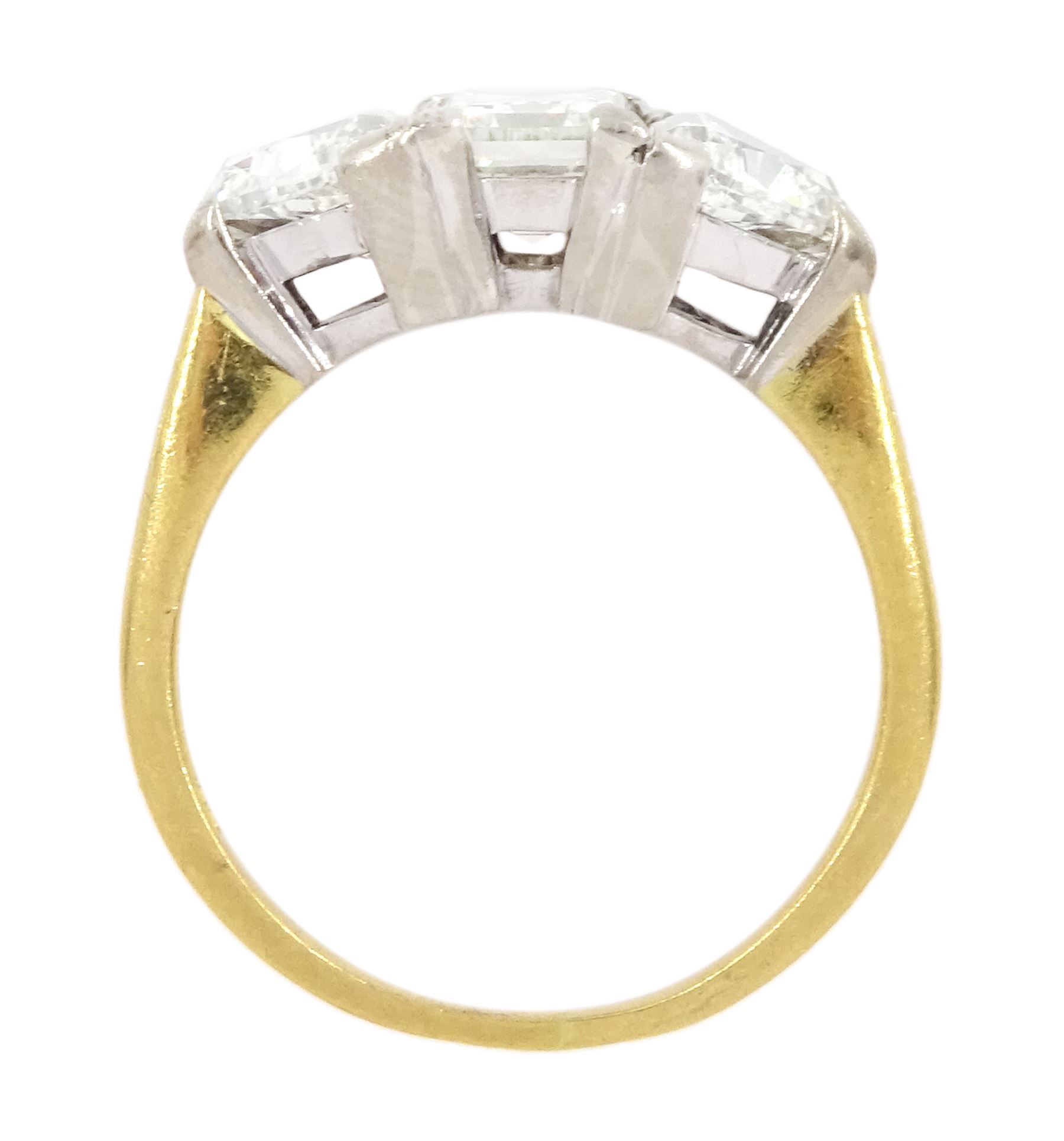 18ct gold three stone emerald cut and trillion cut diamond ring, Birmingham 1998, principal diamond approx 1.15 carat, each trillion cut diamond approx 0.80 carat, total diamond weight approx 2.75 carat