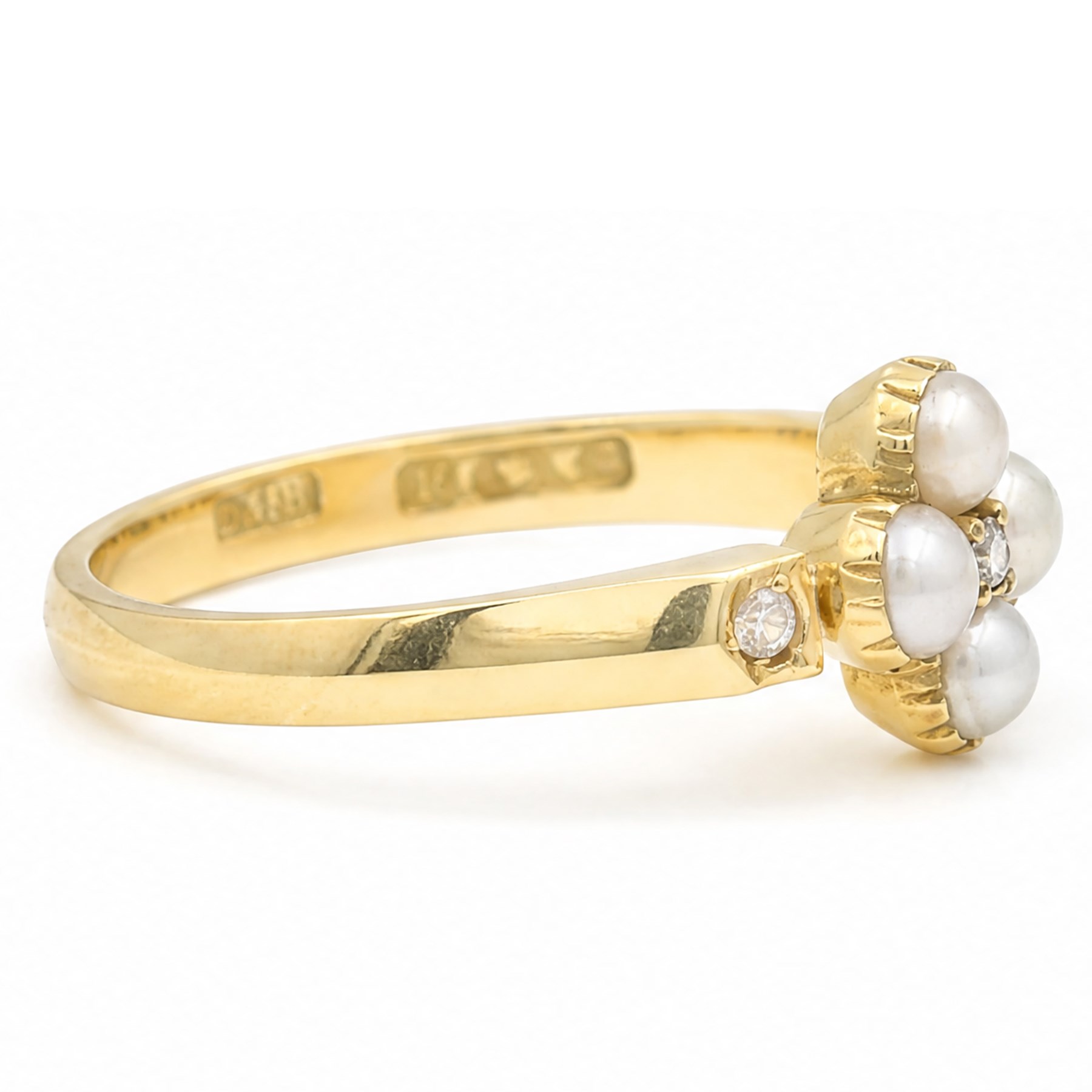 19th/ early 20th century gold pearl and diamond flower head cluster ring, single old cut diamond surrounded by four grey pearls, with a diamond set either side, by Cornelius Desormeaux Sanders & James Francis Hollings Shepherd, stamped 18ct