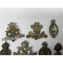 Nineteen Yeomanry metal cap badges including Derbyshire, Northamptonshire, Essex, Glamorgan, Staffordshire, City of London, Surrey, Shropshire, Hertfordshire etc; together with eleven Fusiliers badges including Lancashire, Royal Welch, Northumberland etc (30)