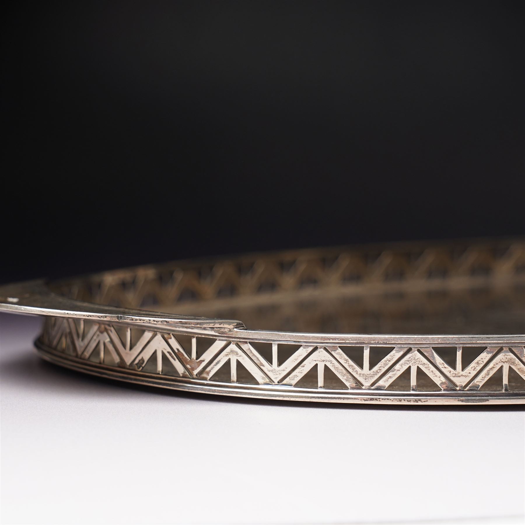 Silver oval tray with pierced rim and flattened handles W47cm Sheffield 1934 Maker Mappin & Webb