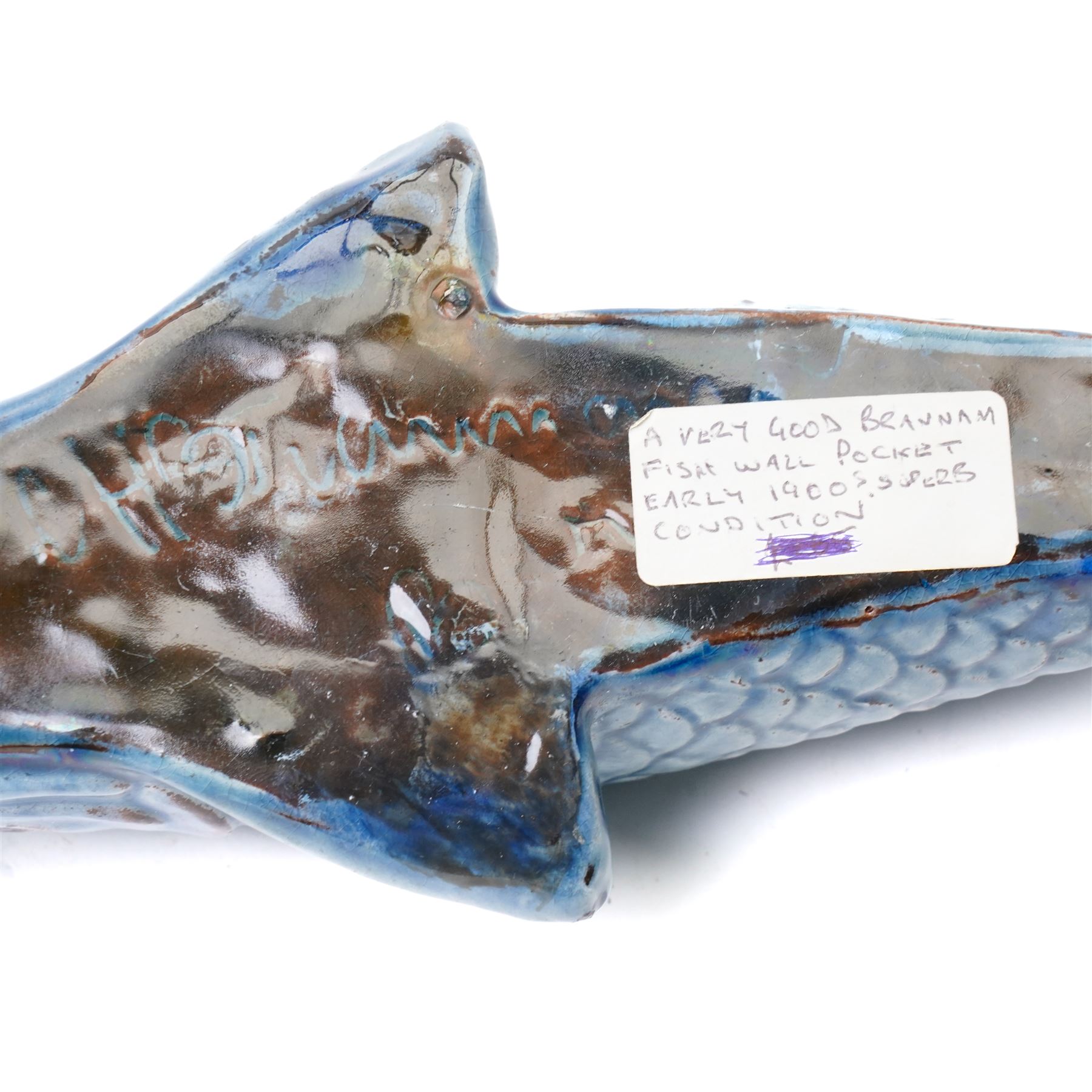 Early 20th century C H Brannam for Barum pottery wall pocket in the form of a fish, signed to base, H28cm
