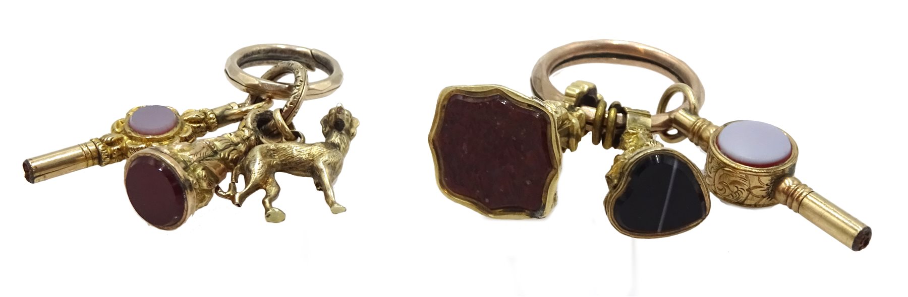  Victorian gold mounted and pinchbeck hard stone pocket watch keys, hard stone fobs and dog charm   
