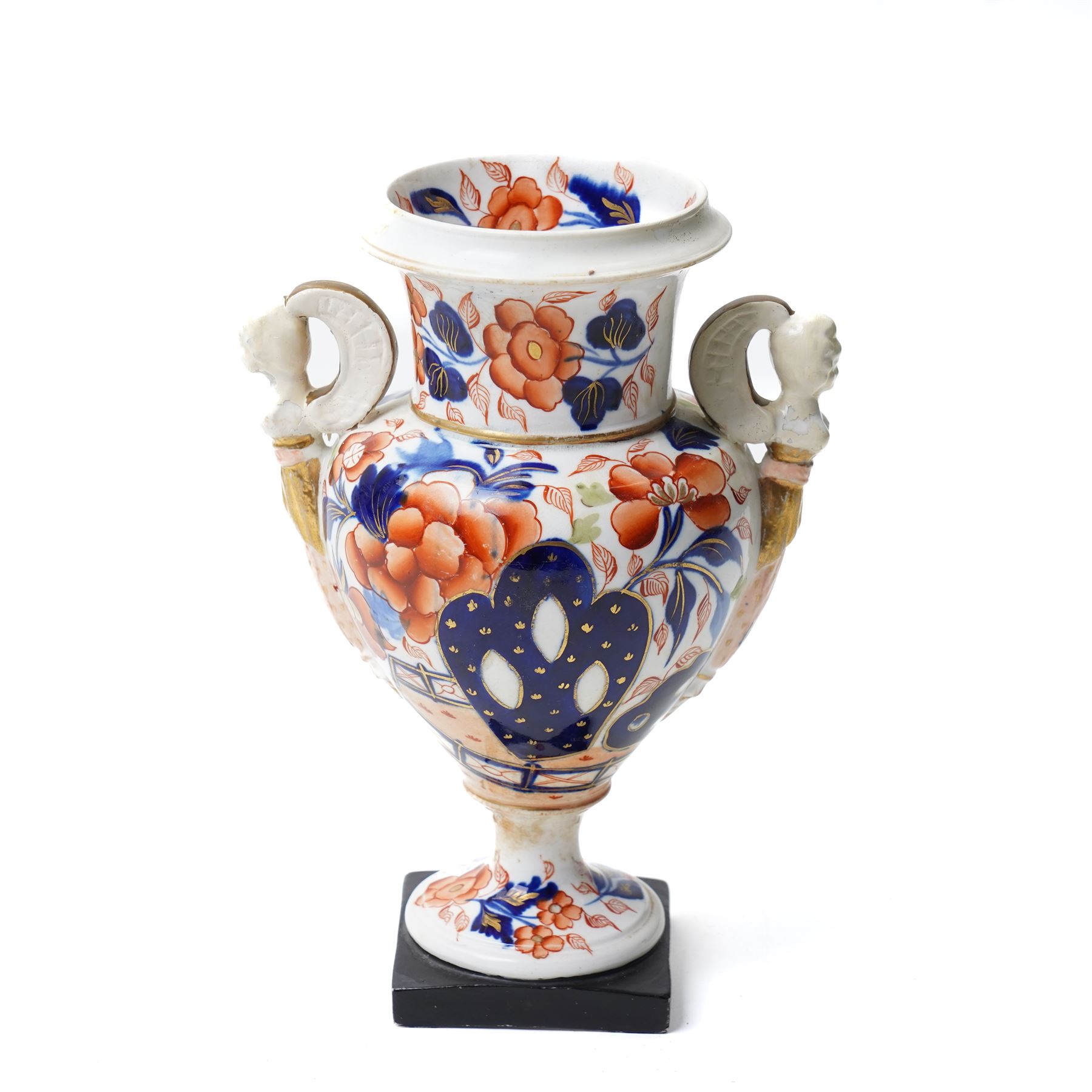 19rh century German porcelain centrepiece with pierced cover decorated with applied flowers and figures at the base H31cm,  near pair of scent flasks with applied flowers and a two-handled vase