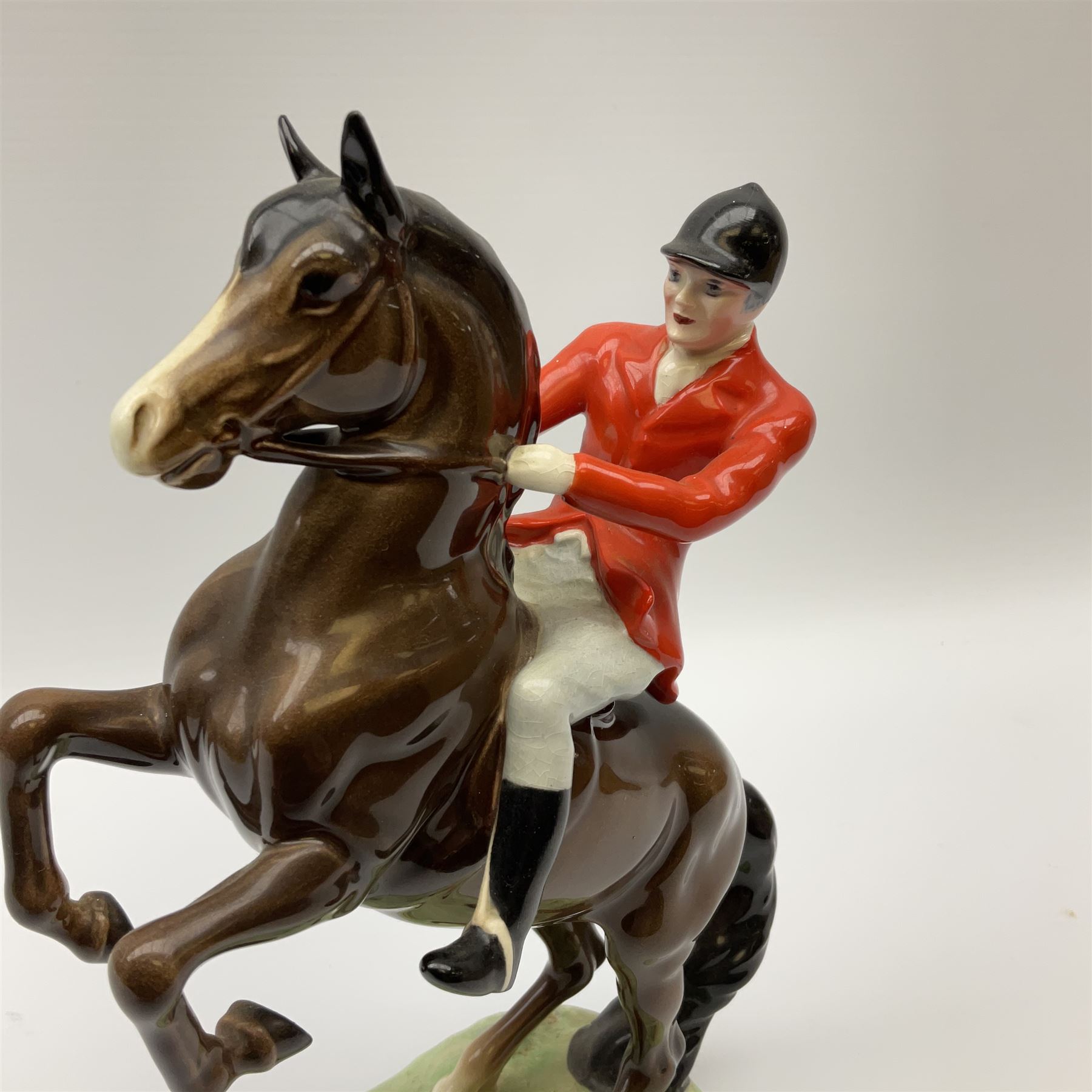 A Beswick model of a huntsman on rearing horse, model no 868 2nd edition, with printed mark beneath, H25cm. 