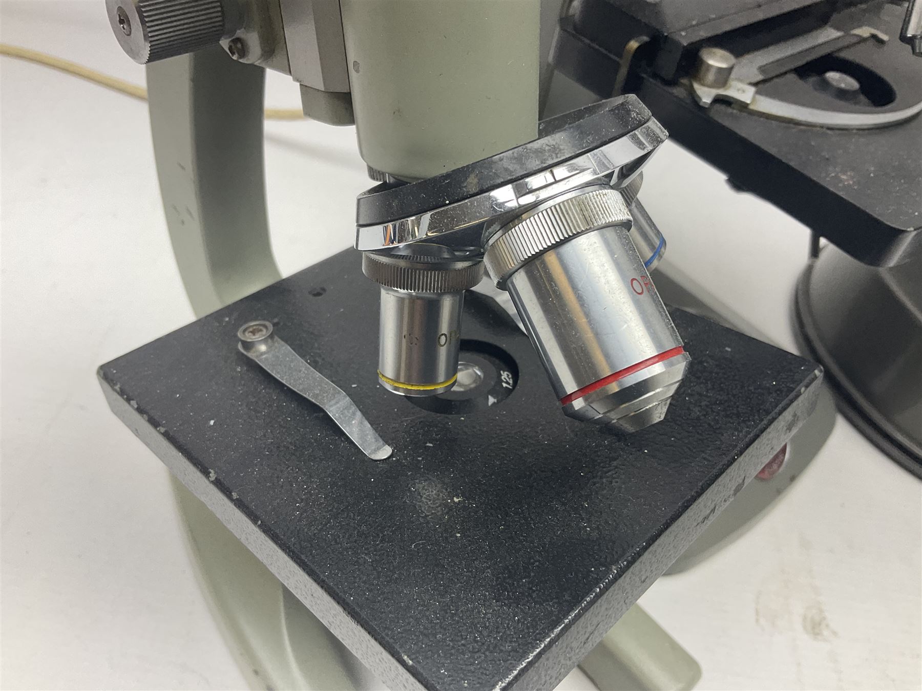 Four microscopes, comprising C Baker London Vickers, Back Diamax no 40956, Opax ABF no 232733 and one other 