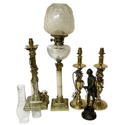 Oil lamp with frosted floral shade and cut glass reservoir, upon cast brass and marble base, together with a cast brass Corinthian column table lamp, pair of brass table lamps and a composite metal figure of a violinist 