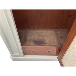 Victorian white painted wardrobe, the projecting cornice over centre mirror glazed door, the interior fitted with drawer and two hinged compartments, plinth base