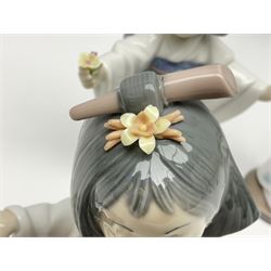 Six Lladro figures of the China doll set and Oriental doll set, comprising Playing the Flute no.6150, Bearing Flowers no.6151, Flower Gazer no. 6152, Oriental Dance no. 6230, Oriental Lantern no. 6231 and Oriental Beauty no. 6232, largest H20cm