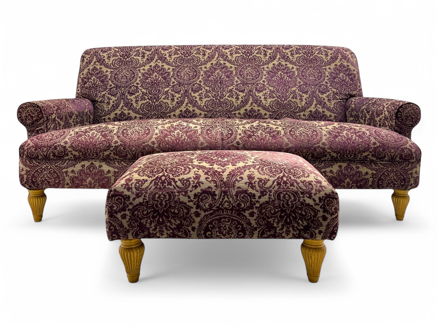 Multi-York - contemporary two-seat sofa, upholstered in damask fabric in shades of burgundy and beige, raised on turned and fluted supports; complete with matching footstool