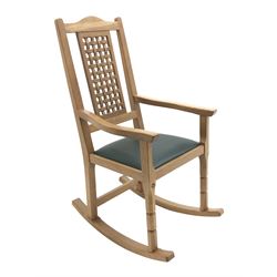 'Foxman' oak rocking chair, arched cresting rail over carved and pierced lattice splat, by Malcolm Pipes of Carlton Husthwaite, Thirsk, W55cm, H108cm, D76cm