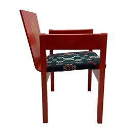 Prince Charles Investiture Chair - designed by Lord Snowdon, manufactured by Remploy, 1969, red finish and decorated with the Prince of Wales's feathers and moto 'Ich Dien' in gilt, later upholstered seat in 1950s design Welsh blanket weave fabric 
