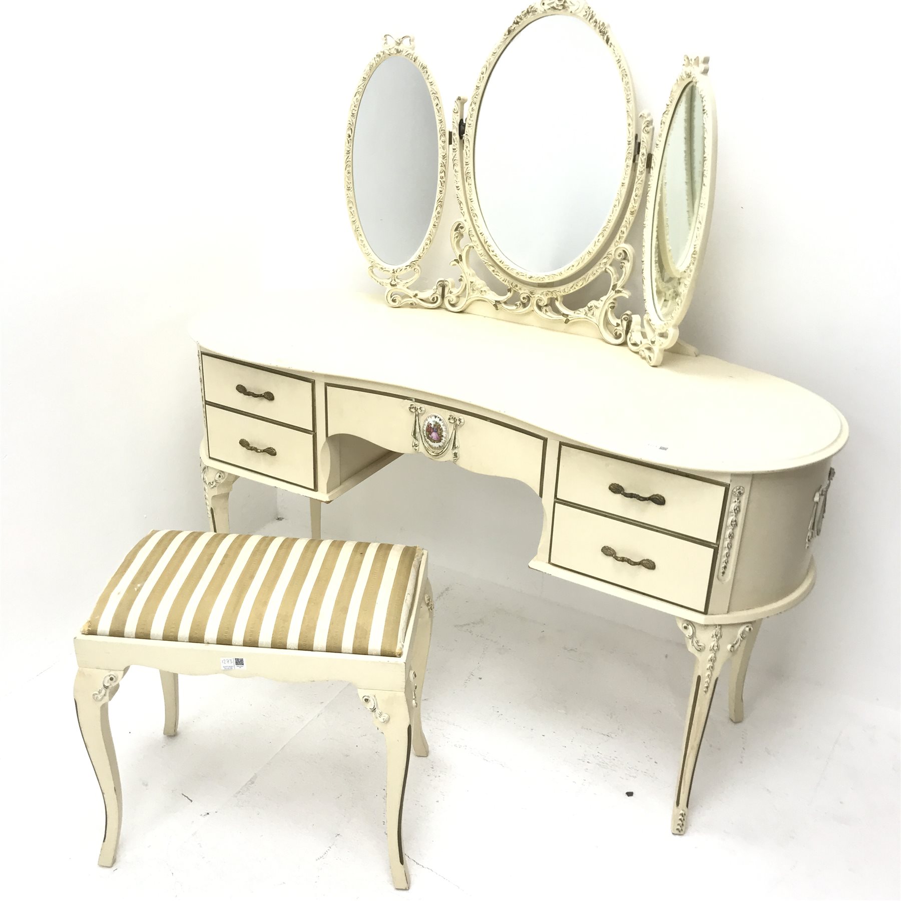 French style cream and gilt kidney shaped dressing table, three piece raised mirror back, one long and four short drawers, cabriole legs, W132cm
