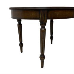 Georgian design mahogany coffee table, oval crossbanded top, on turned and fluted supports