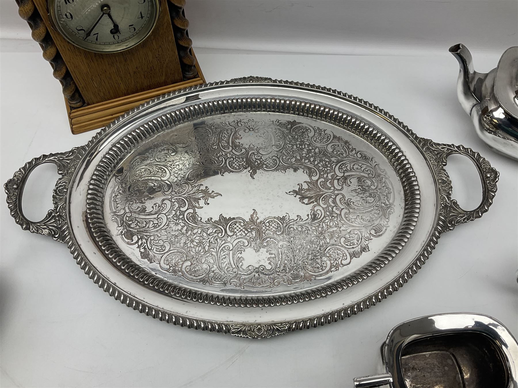 Walker and Hall silver plated tea set, comprising coffee pot, teapot, milk jug and sucrier, together with silver plated tray and a wooden clock with barley twist decoration, clock H28cm