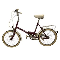 raleigh shopper style small wheel folding bicycle and boys mountain type bicycle - THIS LOT IS TO BE COLLECTED BY APPOINTMENT FROM DUGGLEBY STORAGE, GREAT HILL, EASTFIELD, SCARBOROUGH, YO11 3TX