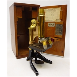  E Leitz Wetzlar black japanned and lacquered brass monocular microscope No.86926, rack & pinion coarse and fine adjust, three objective turret on horse shoe base with additional ocular, retailed by W Watson & Sons, in fitted mahogany case, H28cm, case, H34cm  