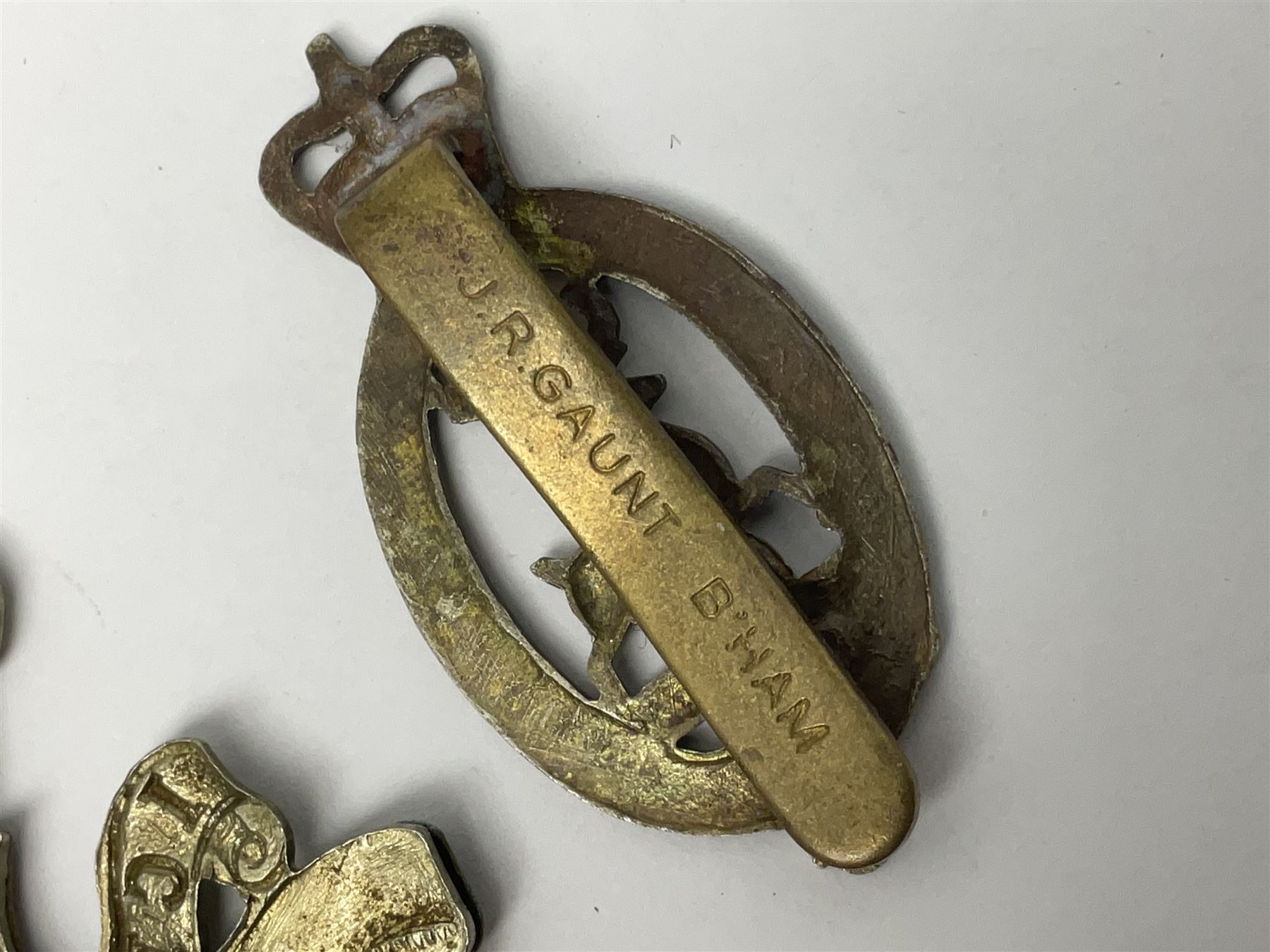 Nineteen Yeomanry metal cap badges including Derbyshire, Northamptonshire, Essex, Glamorgan, Staffordshire, City of London, Surrey, Shropshire, Hertfordshire etc; together with eleven Fusiliers badges including Lancashire, Royal Welch, Northumberland etc (30)