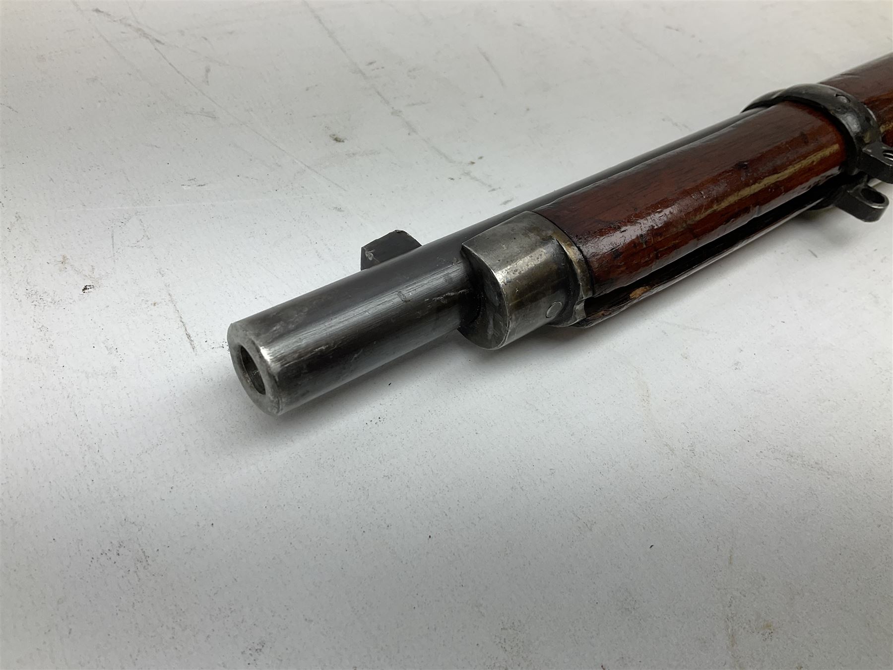 Westley Richards .310 Cadet Martini action rifle, the 63.5cm smooth bored barrel with one barrel band, walnut stock stamped 93/352 with hinged compartment to butt, serial no.3365, L103cm