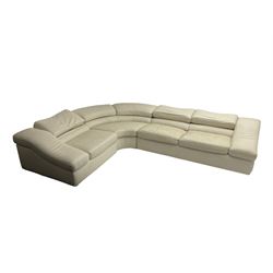 Natuzzi - 'Wave' corner sofa, upholstered in cream leather, in three sections with adjustable back rests 