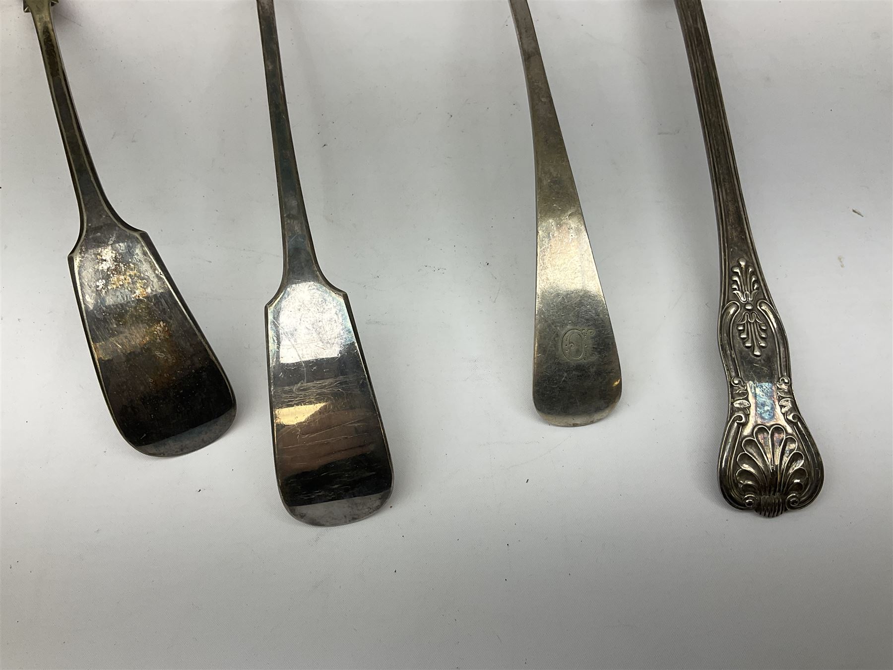 Two silver plated Fiddle pattern soup ladles, a silver plated Old English pattern soup ladle, and a silver plated Kings pattern basting spoon, (4)