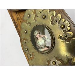 Victorian olive wood book slide, the arched supports with scrolling brass mounts enclosing KPM type porcelain plaques depicting a young female figure in diaphanous veil holding an oil lamp, her arm leaning upon a stone column, retracted W36cm, extended W56cm