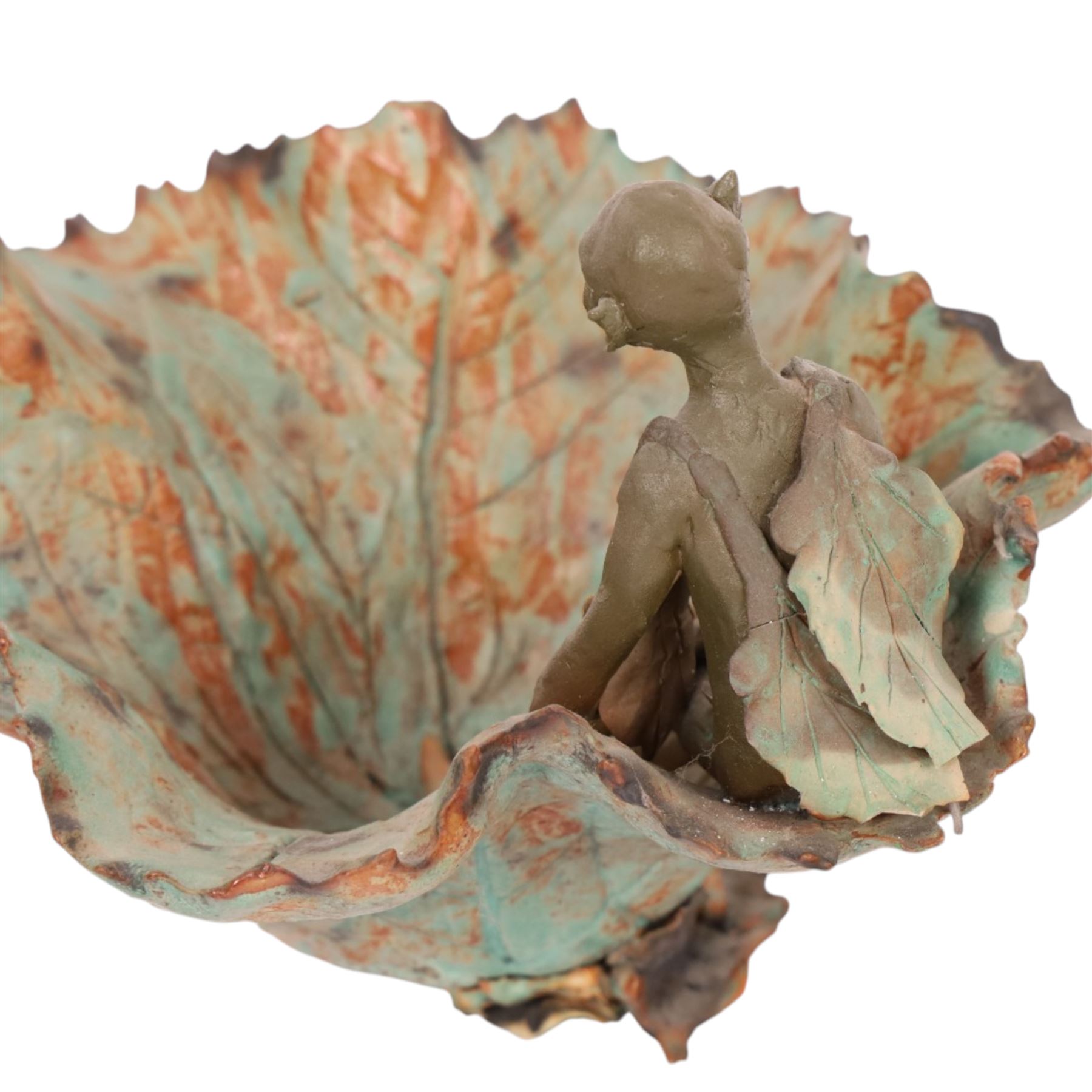 Joan Bideau dish, modelled as a leaf with seated goblin figure, together with three others  and studio pottery dragon by Jane Tudor