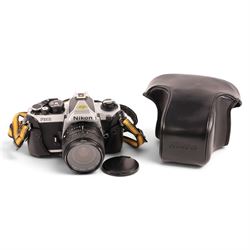 Nikon FM2 film camera body serial no. 7814849 with a Sigma 24mm lens serial no.5083190, ca...
