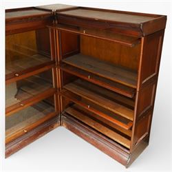 Globe Wernicke - early 20th century corner bookcase, comprising six sections, panelled sides raised on a moulded plinth base  