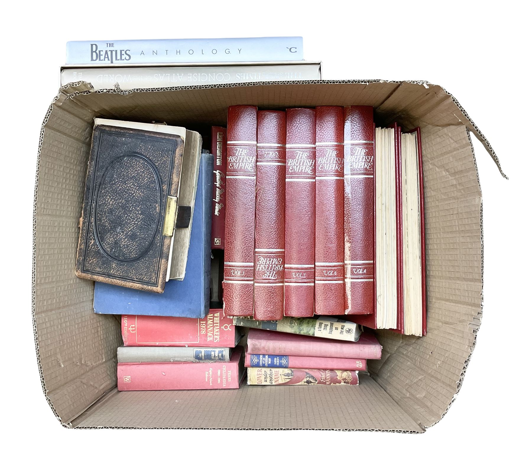 Quantity of books to include The Beatles Anthology hardback, published 2000, leather effect bound The British Empire volumes, The Times Atlas of the World, and other books to include the Bible etc