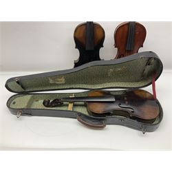 German violin c1890 with 36cm two-piece maple back and ribs and spruce top; bears label 'Antonius Stradivarius Cremona Faciebat Anno 1729' L59.5cm overall; in ebonised wooden 'coffin' case; and two German violins c1890 for completion - one bearing a Stradivarius label, the other a Ruggeri label; both in carrying cases (3)