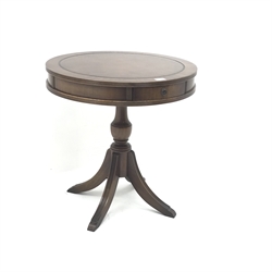  Regency style mahogany circular drum table, inset leather top, two frieze drawers, single column support on three out splayed feet, D61cm, H64cm  