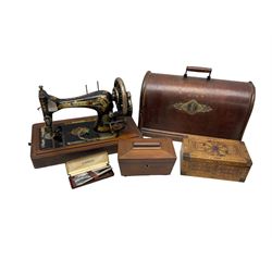 Cased singer sewing machine, no 14 080775 , together with tea caddy and inlaid marquetry box and tea caddy of sarcophagus form and cased set of two Parker pens