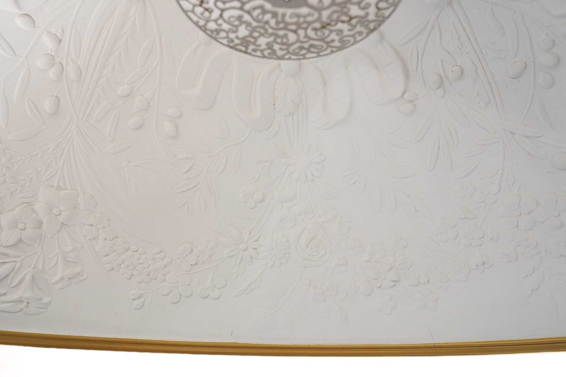 Marcel Wanders for Flos - pair of 'Skygarden S2' suspension lights, the monumental gilt domed shades concealing richly modelled white plaster interiors of Baroque-inspired floral and foliate ornament, with a large moulded central ceiling rose comprised of acanthi and extending ribbon festoons