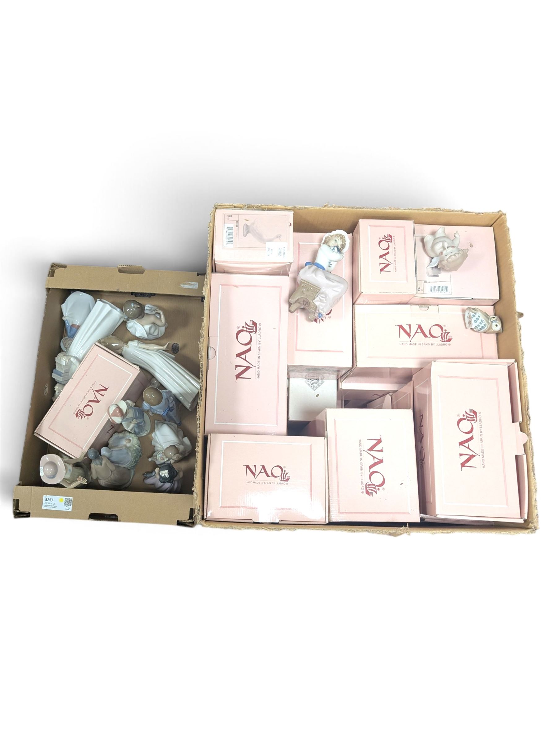 Collection of Nao figures, including boxed examples, in two boxes