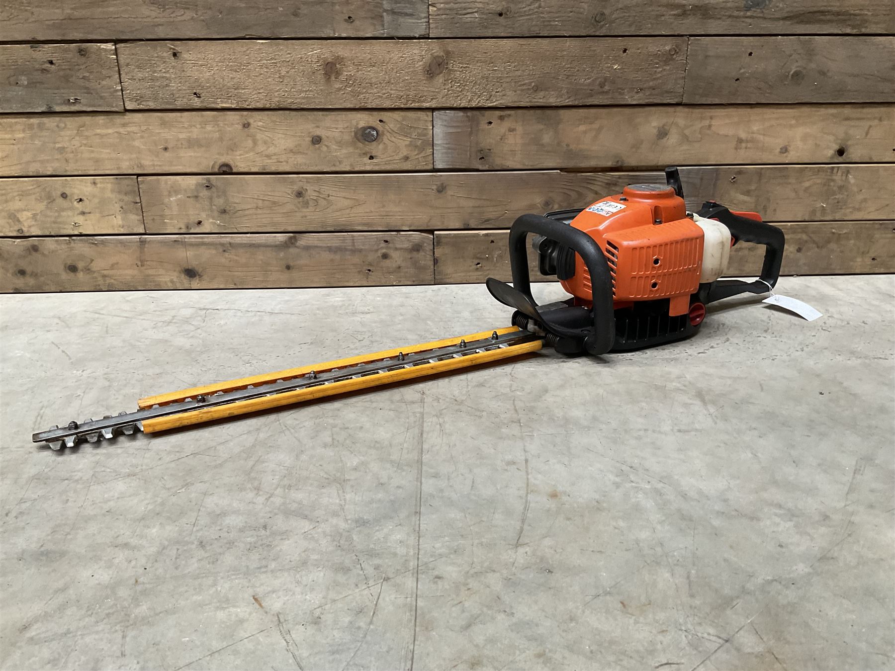 Husqvarna 141 petrol chainsaw and a Husqvarna 226HD75S petrol hedge cutter