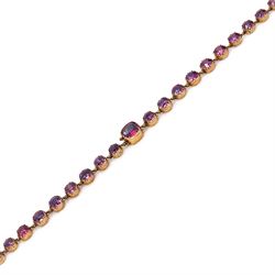 19th century gold garnet rivière necklace, set with forty-four graduating cushion cut rhodolite garnets (possibly doublets), in a velvet and silk lined case by Ollivant & Botsford, Manchester