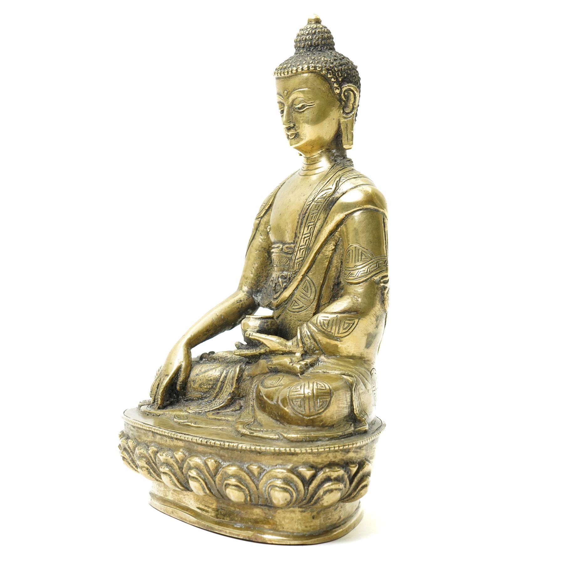 Late 19th/early 20th century brass Buddha in lotus position holding a 'singing' bowl H21cm